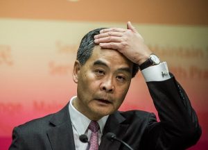 Hong Kong Chief Executive Leung Chun-ying addresses a press conference after his maiden policy address in Hong Kong on January 16, 2013. Hong Kong's China-backed leader plans to tackle the city's housing crisis in a policy speech aimed at soothing anger following a series of mass protests urging him to quit. AFP PHOTO / Philippe Lopez (Photo credit should read PHILIPPE LOPEZ/AFP/Getty Images)